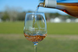 glass of wine with an outdoors background